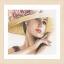 Femme avec chapeau