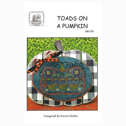 Toads On A Pumpkin