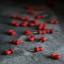 Punaises avec tête en bois rouges