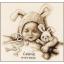 Bébé et lapin câlin