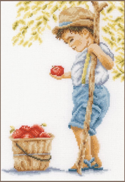 Garçon avec des pommes